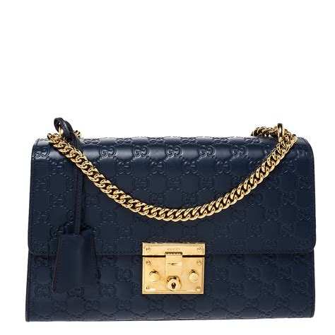 navy blue Gucci purse